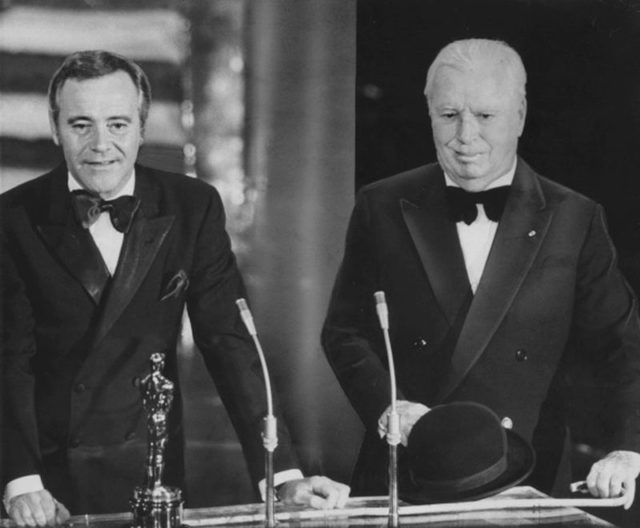 Chaplin (right) receiving his Honorary Academy Award from Jack Lemmon in 1972. It was the first time he had been to the United States in 20 years