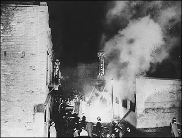 Smoke rises from the Cocoanut Grove during the fire.  