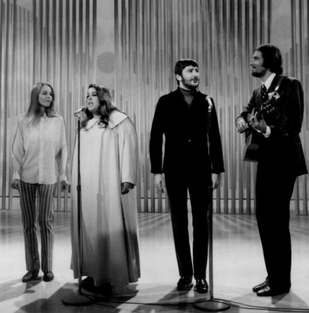 Photo of The Mamas and the Papas performing on The Ed Sullivan Show. From left-Michelle Phillips, Cass Elliot, Denny Doherty, and John Phillips (1967)