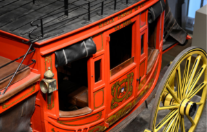 A modern replica of a Wells Fargo stagecoach on display