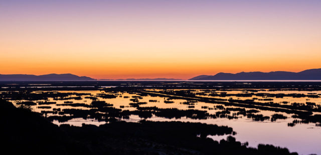 View of Lake Titicaca during sunrise. Photo credit