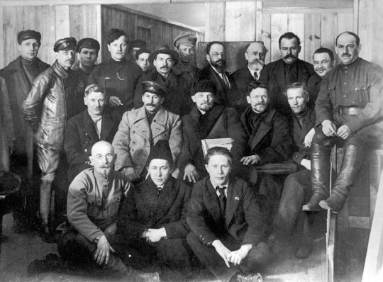 A group of participants in the 8th Congress of the Russian Communist Party, 1919. In the middle are Stalin, Vladimir Lenin, and Mikhail Kalinin.