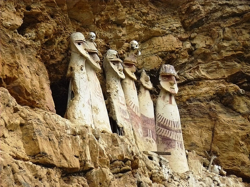 The painted warriors’ sarcophagi of Karajia. Mummies of famed warriors were entombed inside the sarcophagi and placed on cliffs, with the skulls of their enemies placed on top   Photo credit