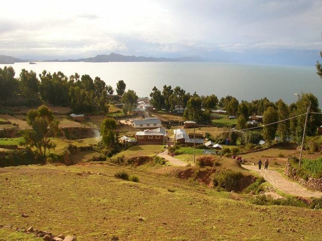 Amantani Island – Peru. In the background Capachica Peninsula. Photo credit