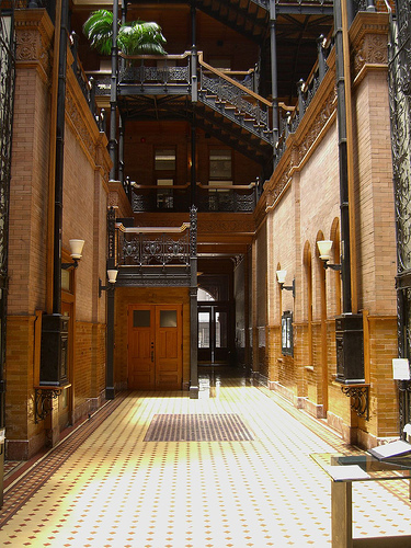 The iron-wrought interior of the Bradbury Building. Visitors are not allowed beyond the ground floor level. Photo Credit