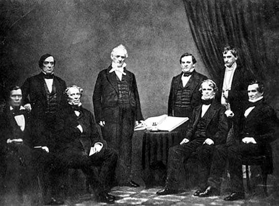 President Buchanan and his Cabinet From left to right: Jacob Thompson, Lewis Cass, John B. Floyd, James Buchanan, Howell Cobb, Isaac Toucey, Joseph Holt and Jeremiah S. Black, (c. 1859)