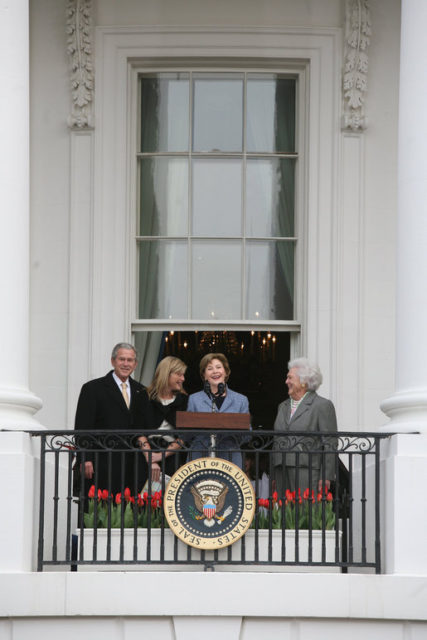 Laura Bush with George W. Bush, their daughter Jenna, and former first lady Barbara Bush, welcomes guests to the South Lawn of the White House, for the 2008 White House Easter Egg Roll