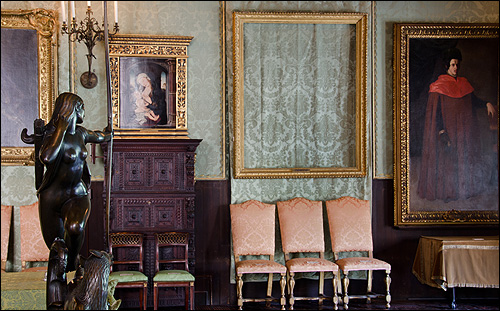 the empty frame of “The Storm on the Sea of Galilee” inside the Dutch Room of the Isabella Stewart Gardner Museum