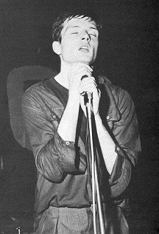 Ian Curtis performing at “The Mayflower” in Manchester in 1979  Photo Credit