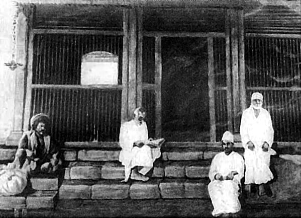 Shirdi Sai Baba on the right and some of his devotees