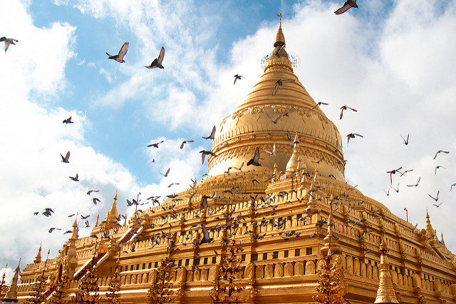Shwezigon Pagoda lays in the Shwe Zigon settlement close to Bagan and serves as a pilgrimage center. It was built during the reign of King Anawrahta, the founder of the Pagan Dynasty Photo Credit