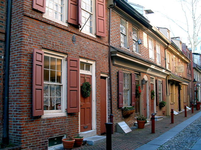 Historic Elfreth’s Alley homes in Philadelphia, Pennsylvania, dressed up for the holidays  Photo Credit