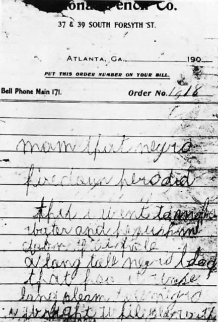 One of the two murder notes found near the body.
