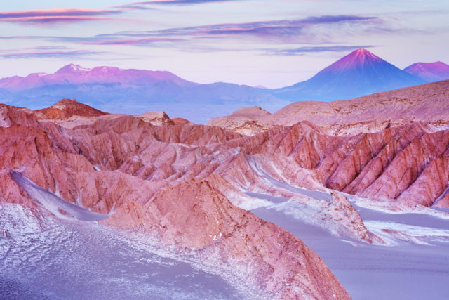 “Valle de la Muerte with Volcan Licancabur in the Atacama Desert, northern Chile, at sunset.”