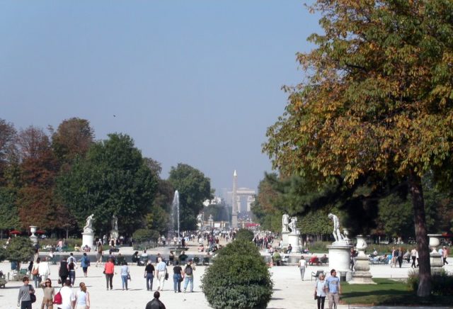 The Tuileries Garden, looking from the large round basin toward the Place de la Concorde and Arc de Triomphe Photo Credit