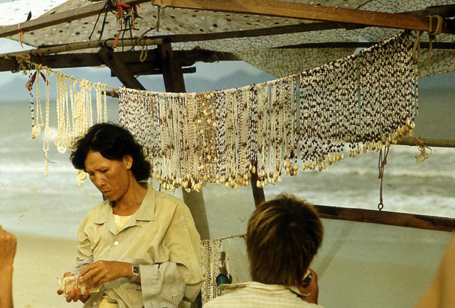 Shell jewelry for sale on a beach in Vietnam, 1990, Photo Credit