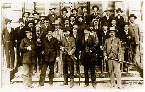 Texas Rangers gathered at El Paso to stop the illegal Maher–Fitzsimmons fight, 1896. In the front row from the left stand Adj. General W. Mabry; Captain J. Hughes; J. Brooks; Bill McDonald (coiner of the phrase); and J. Rogers.