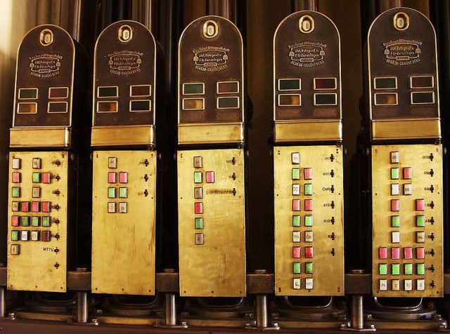 Controllers of the five main lanes with counters, indicator lights, and switch controls Photo Credit