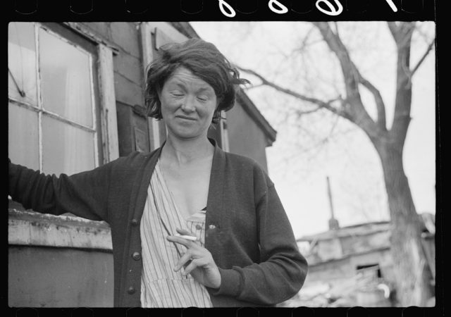 A resident of the river bottoms shacktown in Dubuque, Iowa  Photo Credit