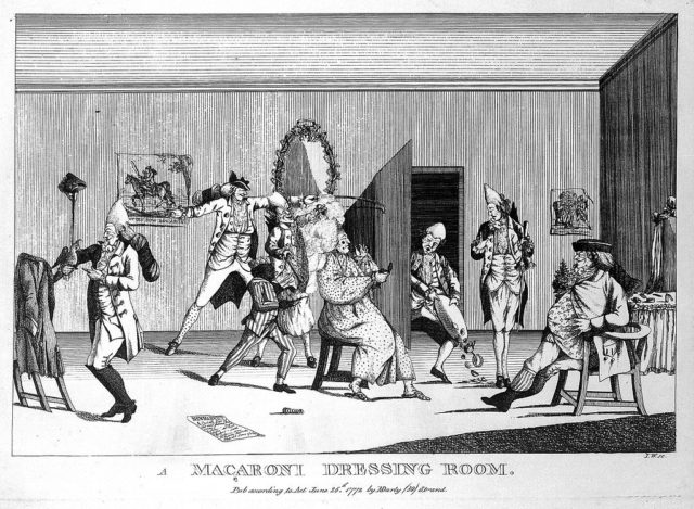 “A macaroni dressing room” cartoon showed the dressing style of the 18th-century upper-class. Photo Credit