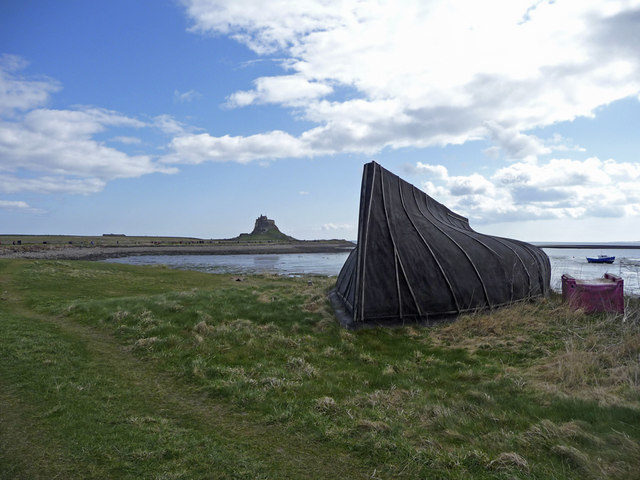 Boat Shed, Lindisfarne, Holy Island, Northumberland. Boat shed with Lindisfarne Castle in the background.Photo Credit