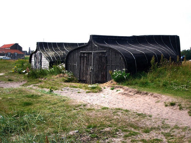 Boat sheds on Holy Island. Photo Credit