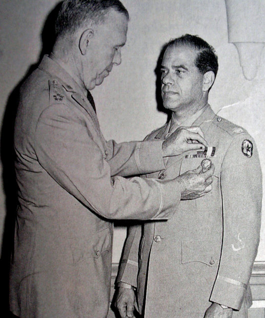 Frank Capra receiving The Distinguished Service Medal from General George C. Marshall, 1945.