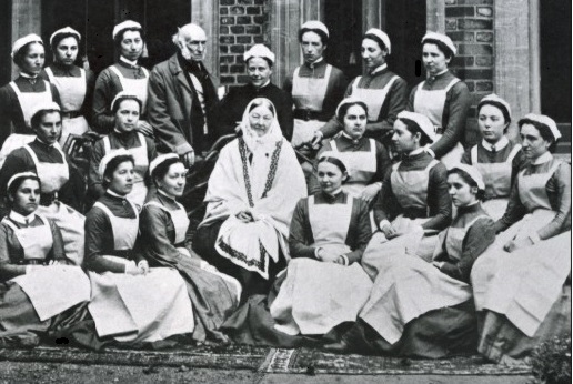 Florence Nightingale (middle) in 1886, with her graduating class of nurses from St Thomas’ outside Claydon House, Buckinghamshire, photo credit