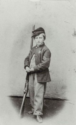 John Clem with gun.