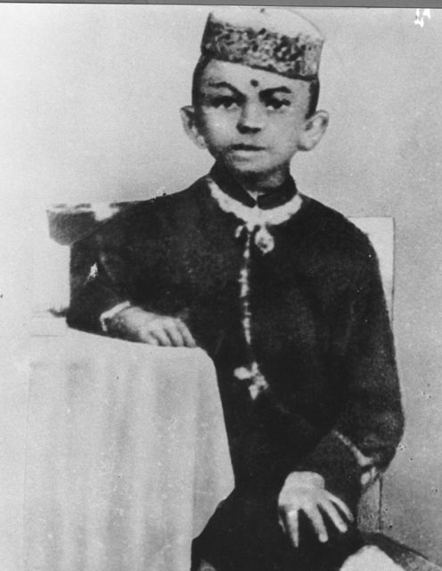 Mohandas Karamchand Gandhi in his earliest known photo, aged 7, c. 1876