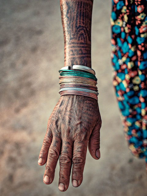 The last tattooed women of the Tharu tribe. Photo Credit: Omar Reda