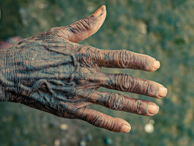 Tattooed hand, Photo Credit