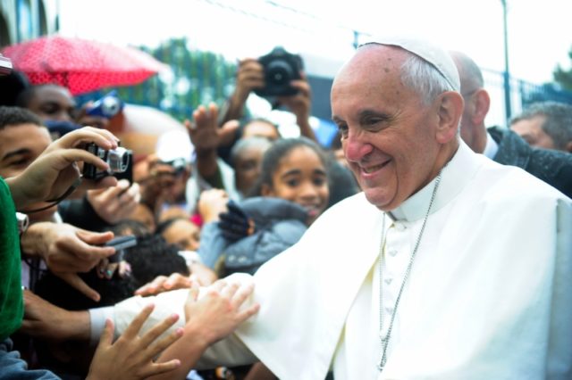 Pope Francis visits a favela in Brazil during the World Youth Day, 2013. Author: Tânia Rêgo/ABr – Agência Brasil – CC BY 3.0 br