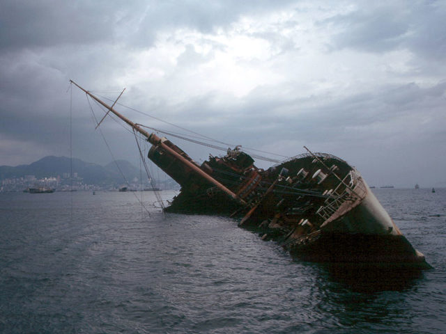 1972: The wreck of Seawise University, the former Queen Elizabeth, in Hong Kong Victoria Harbour. Photo Credit