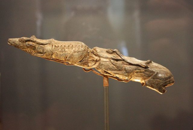 The piece was carved from the tip of a mammoth tusk using stone tools, and then polished and engraved to add detail  Author Val CC BY-SA 2.0