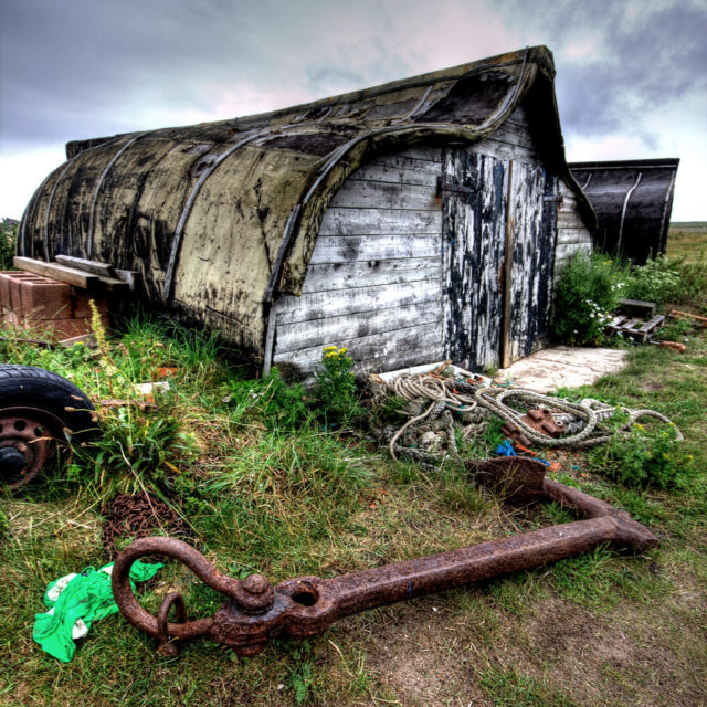 Upturned herring boats. Photo Credit