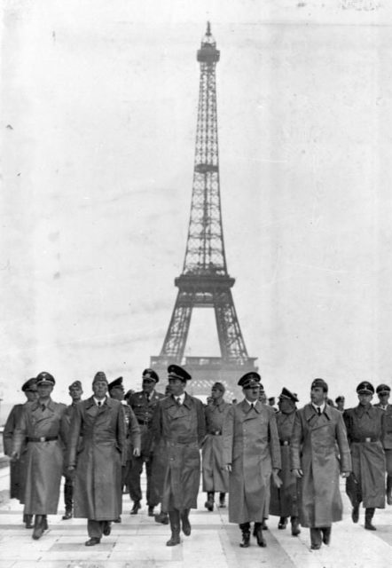 Adolf Hitler strolling in front of the Eiffel tower in Paris, 23 June 1940. Photo Credit
