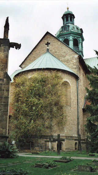 The 1,000 year old rosebush of Hildesheim Cathedral. Photo Credit