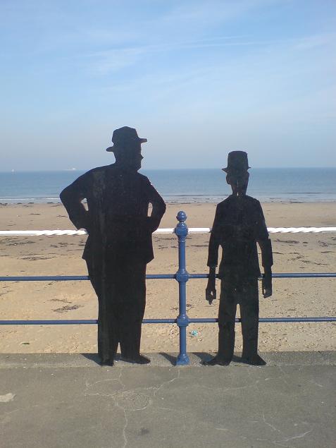 Silhouette portrait of the duo in Redcar, England