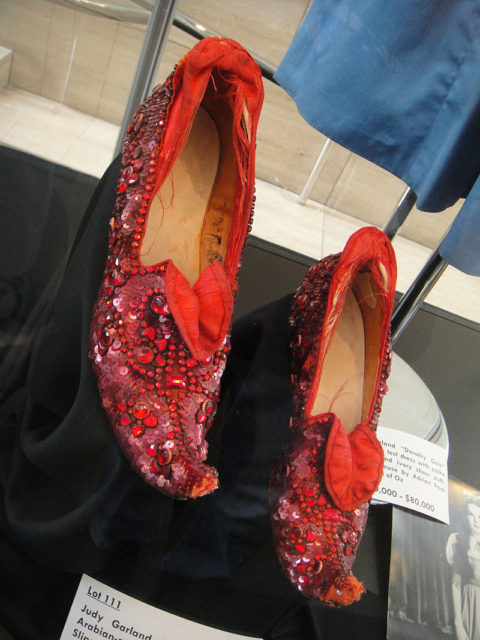 The Arabian-pattern test Ruby Slippers from “The Wizard of Oz” at the Debbie Reynolds Auction. dbking  CC BY 2.0