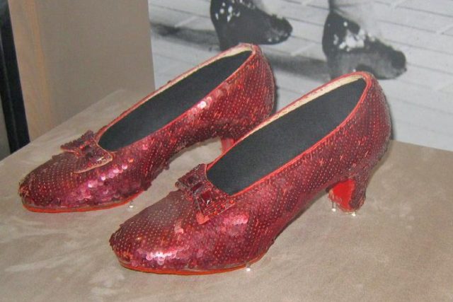 A pair of original Ruby Slippers used in The Wizard of Oz on display at the American History Museum in Washington DC. Photo Credit