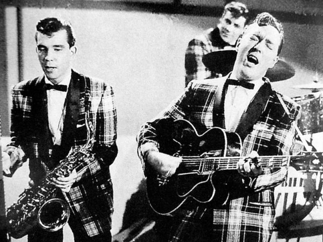 Bill Haley and the Comets wearing tartan shawl collar jackets associated with the rockabilly subculture, 1956.
