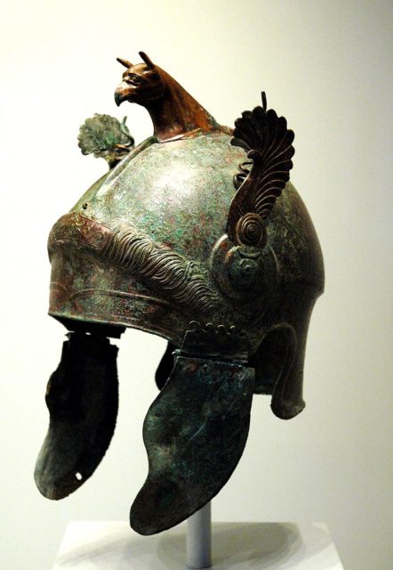 Attic helmet with small bronze decorative wings, Southern Italy 4th Century BC. Author: davide ferro CC BY 2.0.