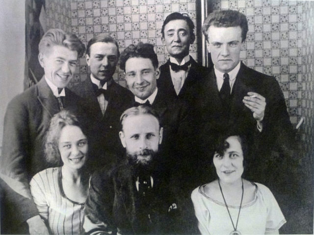 Belgian artists at the home of Victor Servranckx in June 1922. From left to right: (top) René Magritte, ELT Mesens, Victor Servranckx, Pierre-Louis Flouquet, Pierre Bourgeois; (At the bottom) Georgette Berger, Pierre Broodcoorens, Henriette Flouquet. Author: JoJan CC BY 3.0