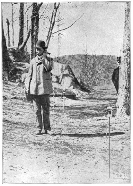 Nathan Stubblefield using his ground-current wireless telephone to receive a March, 1902 test transmission at Washington, D.C.