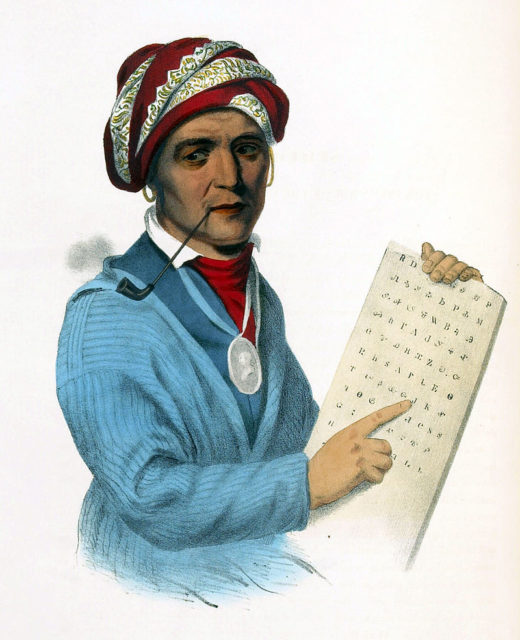 Sequoyah with a tablet depicting his writing system for the Cherokee language. 19th-century print of a painting.