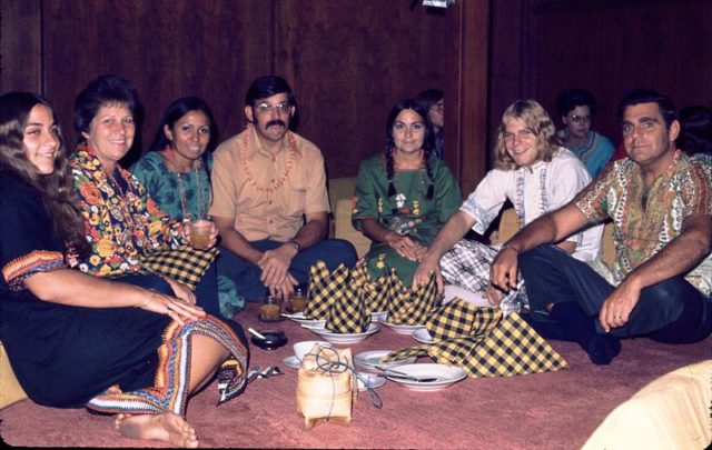 Hippies sitting with the locals in Chiang Mai, Thailand, November 1973.Author: Catatonique. CC BY-SA 3.0