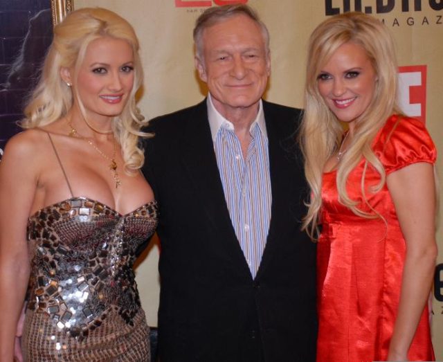 Hefner with his then-partners Holly Madison (left) and Bridget Marquardt, 2007. Author Luke Ford CC BY-SA 2.5