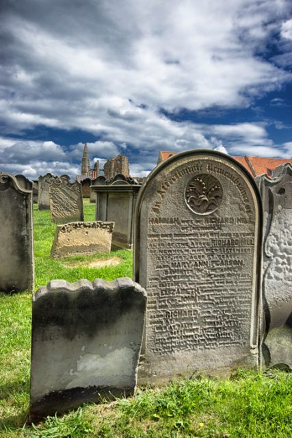 Whitby Abbey and cemetery on the clifftop over Whitby.