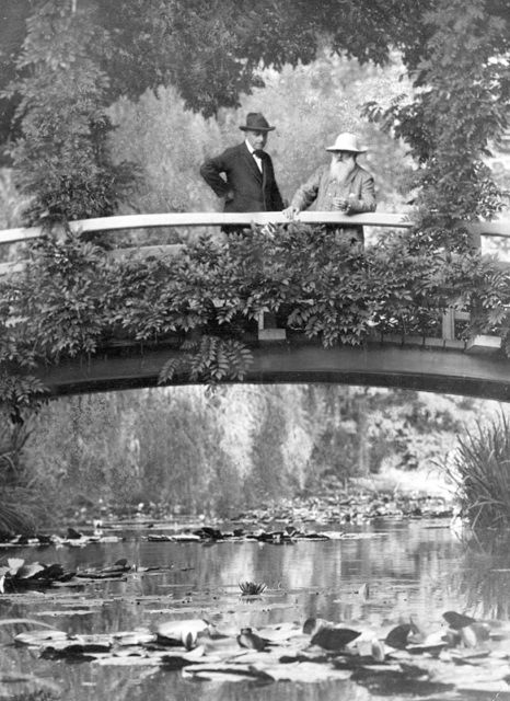 Monet, right, in his garden at Giverny, 1922